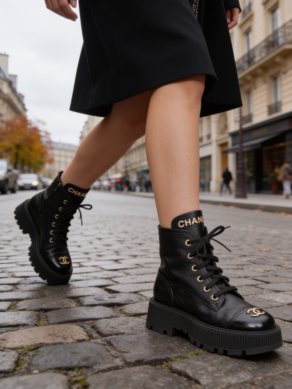 CHANEL Black Leather Moto Boots with Gold logo